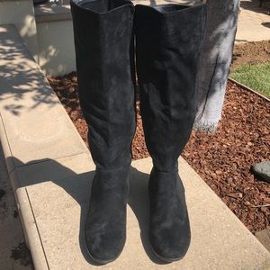 Tall black boots